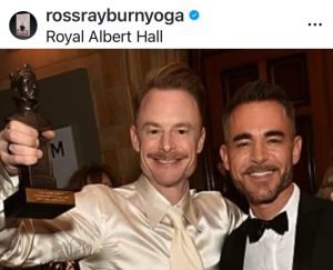 Former Instructor Ross Rayburn celebrates award win with his husband