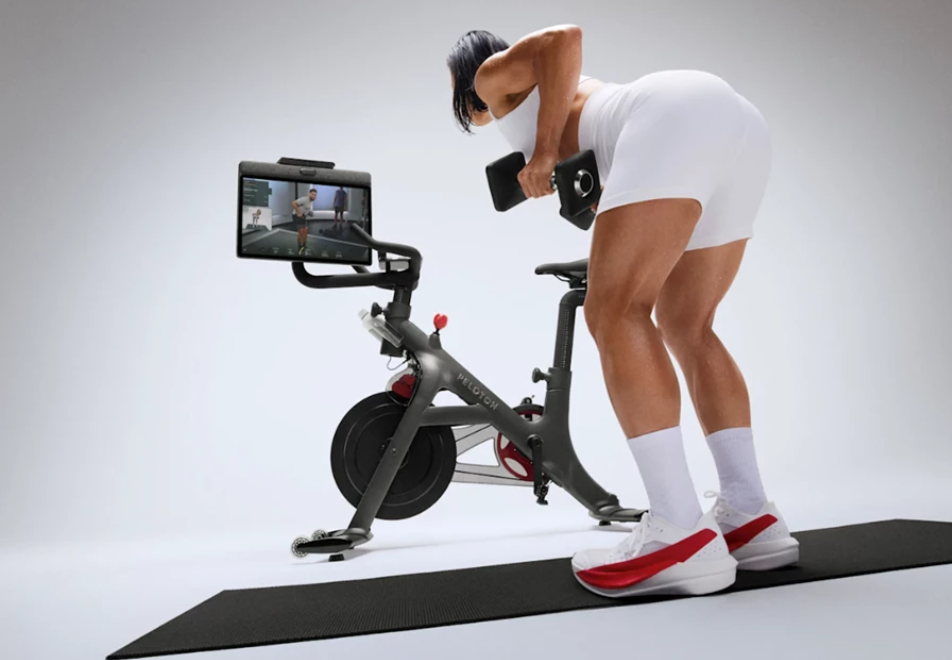 Peloton IQ Insights Woman working out with Peloton IQ