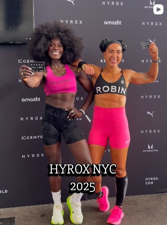 Photo of Robin and Tunde at Hyrox NYC. Robin Arzon Hyrox Miami is up next.