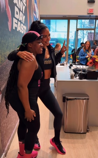 Kirsten Ferguson runner Saucony event with fan