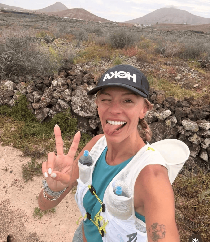 Becs Gentry Canyons 50k - training on a trail with mountains behind
