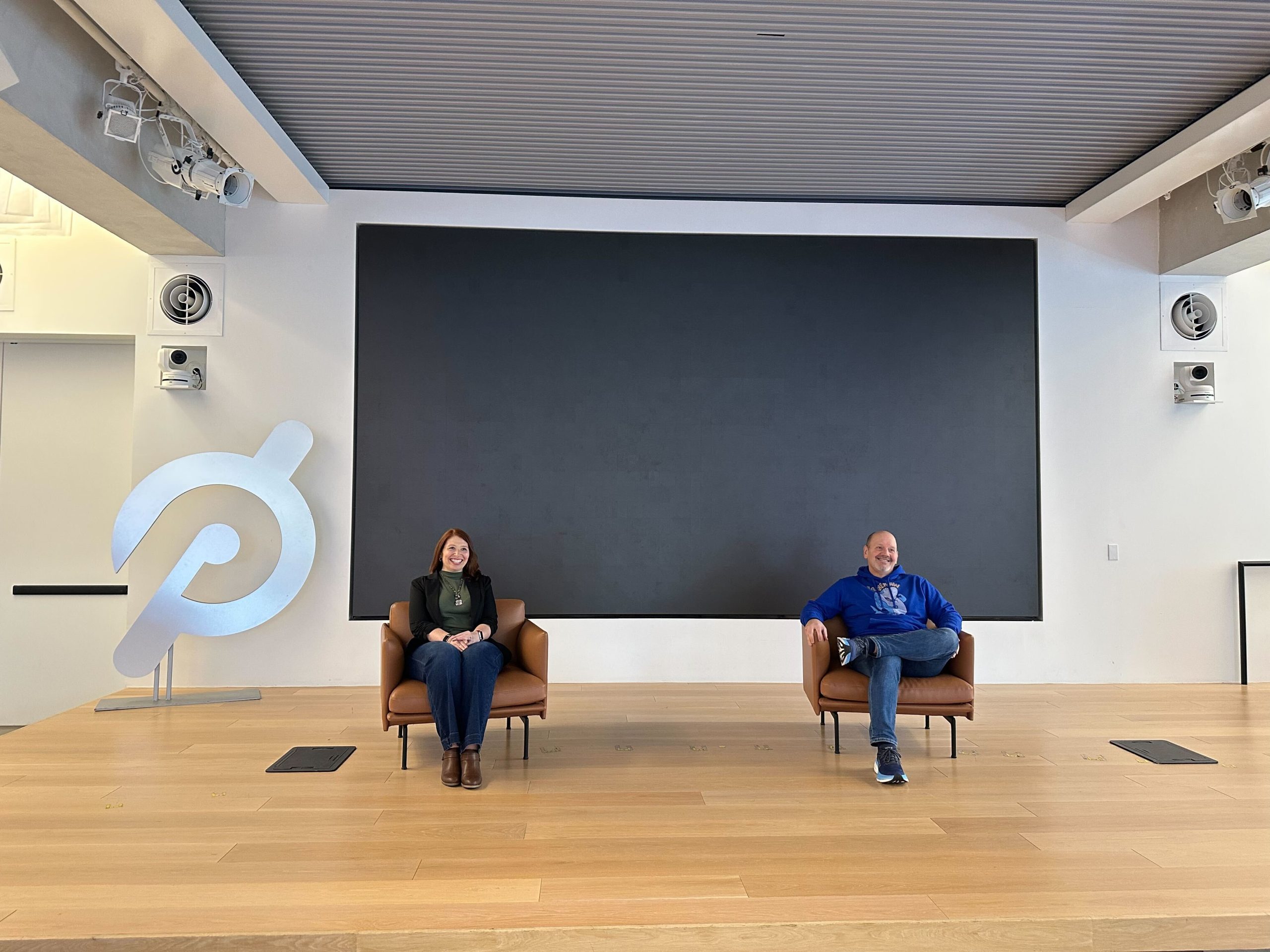 crystal o'keefe and tom o'keefe of the clip out behind the scenes of the peloton podcast at the next table