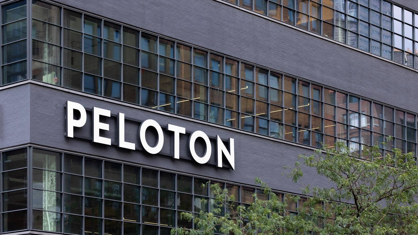 peloton workers lawsuit settlement image of peloton corporate headquarters representing the California labor dispute resolution re: overtime pay violation