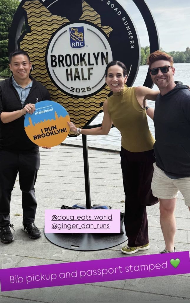 Peloton Instructors Running - Mariana picking up bib for Brooklyn