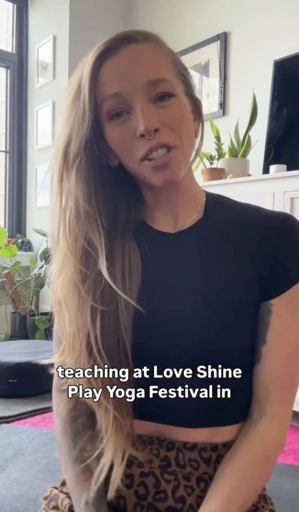 Kirra Michel teaching yoga at Love Shine Play Festival in Asheville North Carolina