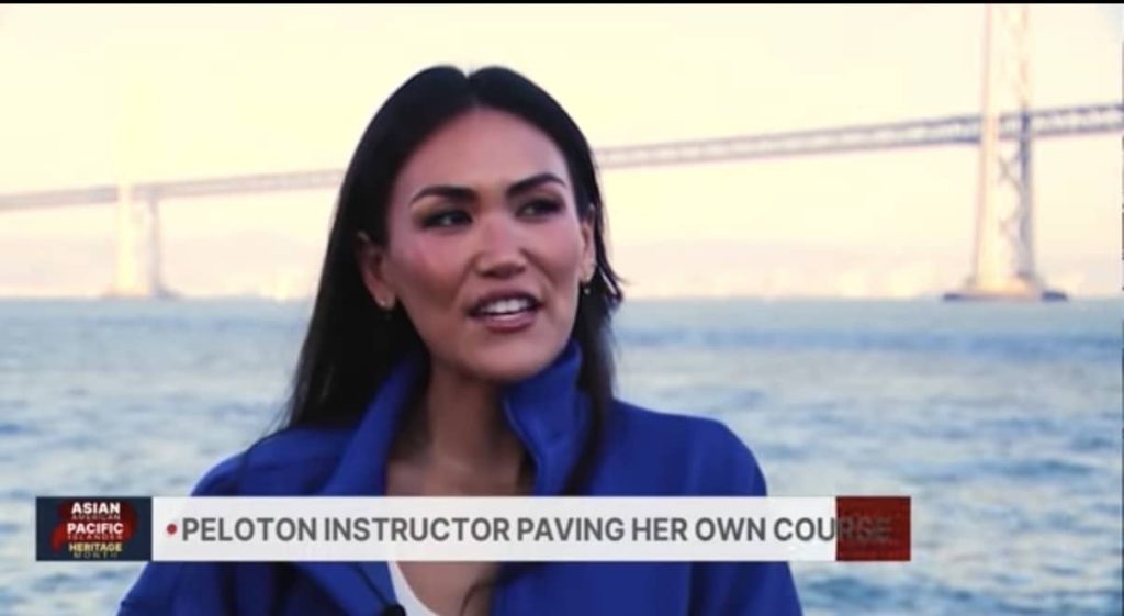 Peloton instructor Katie Wang during her KRON4 California news segment on Asian American fitness representation and Asian Pacific Islander Heritage Month