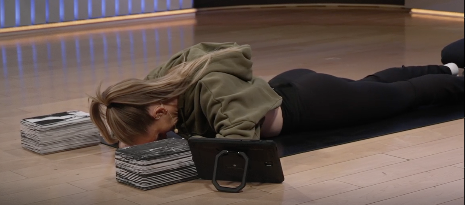Mental Health Rest and Restore Kirra Michel in a yin yoga position