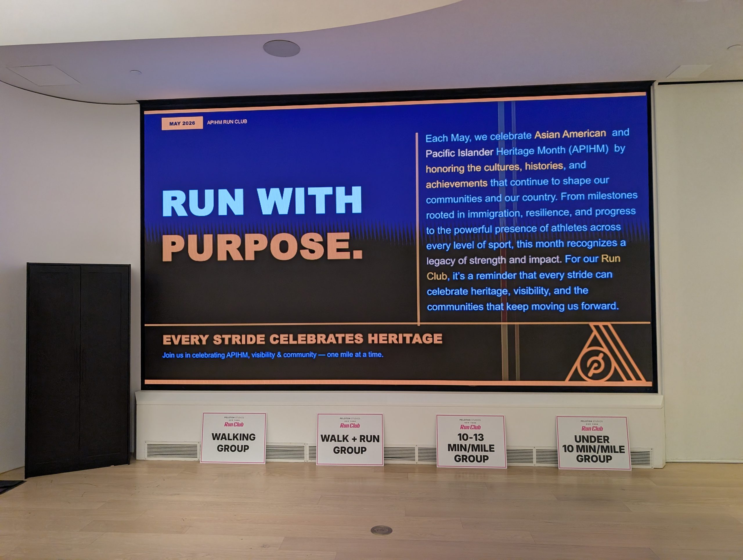 Peloton APIHM Run Club sign with pace groups listed below
