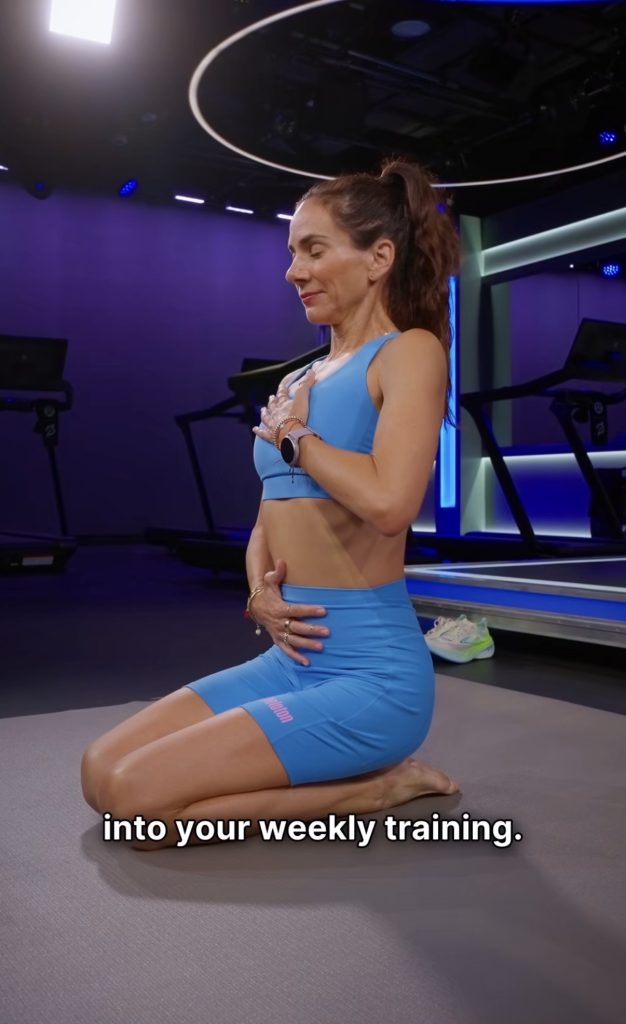 Mariana Fernandez demonstrating a yoga recovery pose with blocks on the mat during a Peloton Run and Flow class