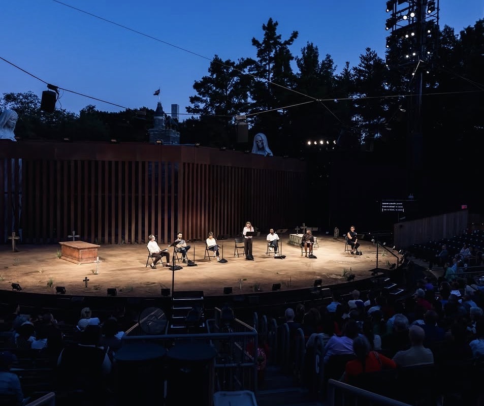 Peloton instructor Matty Maggiacomo reads onstage during Shakespeare in the Park at the Delacorte Theater