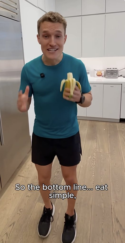 Matt Wilpers eats a banana while summarizing his pre-run fueling tips advice