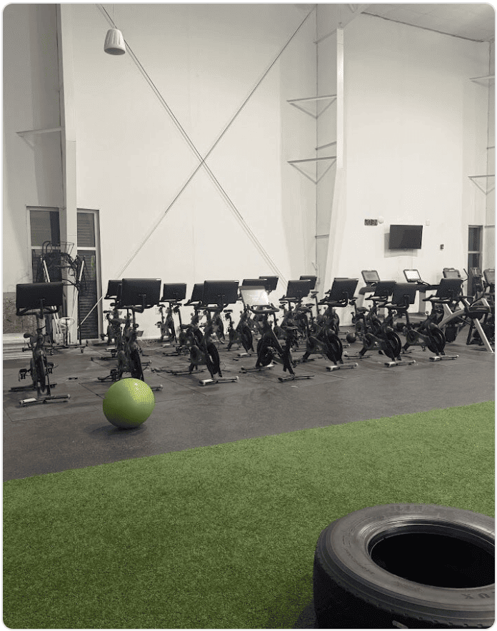 Peloton's Community in Motion visit to XS Tennis Inc. in Chicago