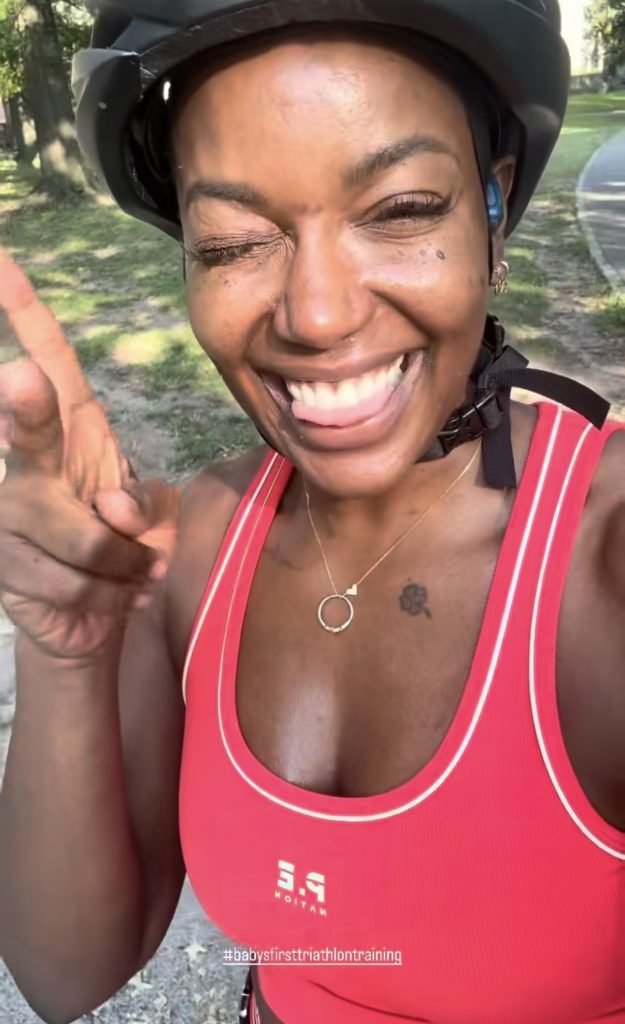 Marcel Dinkins triathlon training moment captured with a joyful reaction after the hill climb