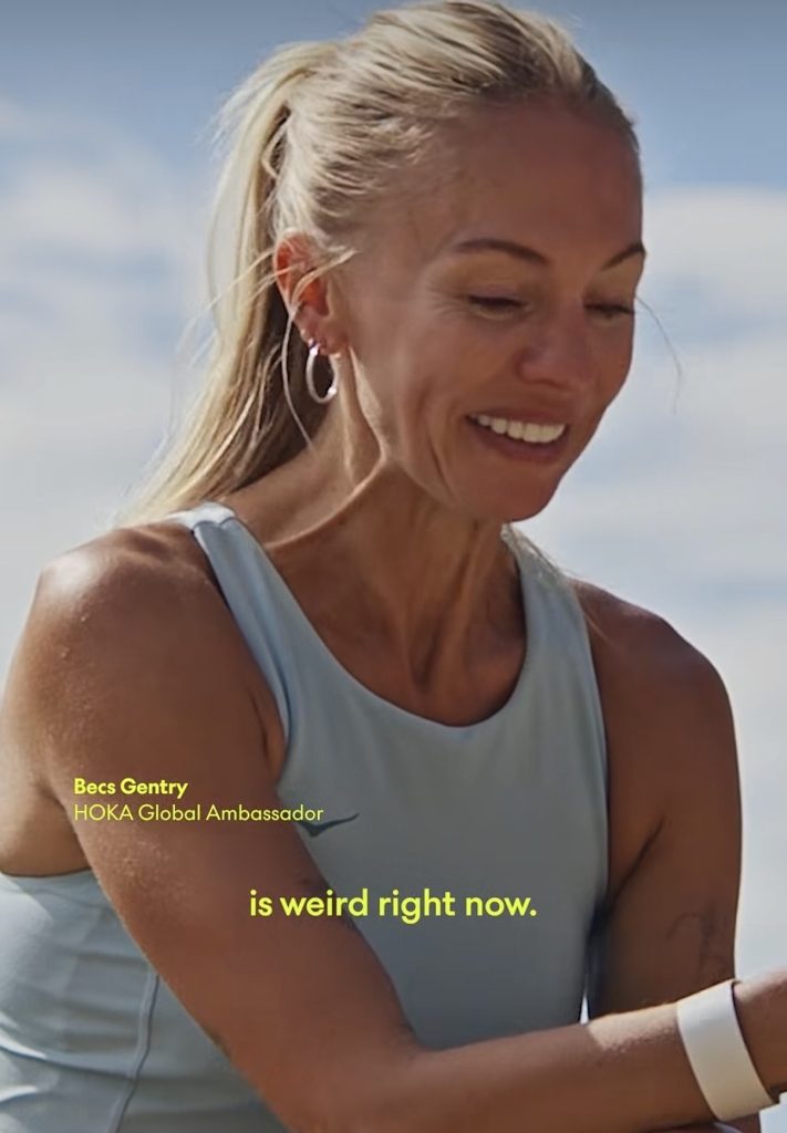 Becs Gentry CCC announcement video still showing her smiling as HOKA Global Ambassador