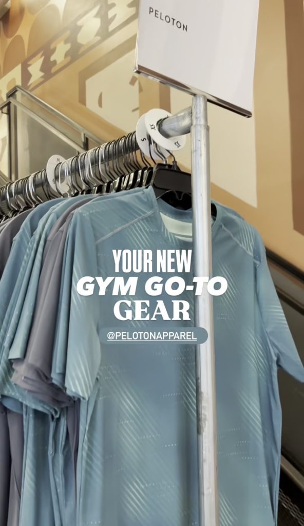 Peloton Apparel sample sale gym apparel rack featuring a new go-to gear graphic