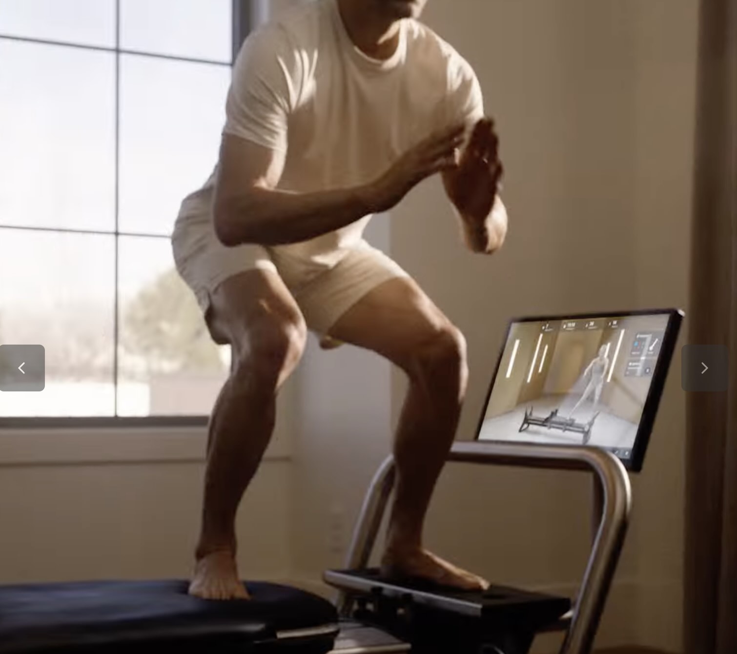 NordicTrack connected Pilates reformer with rotating touchscreen in a home setting