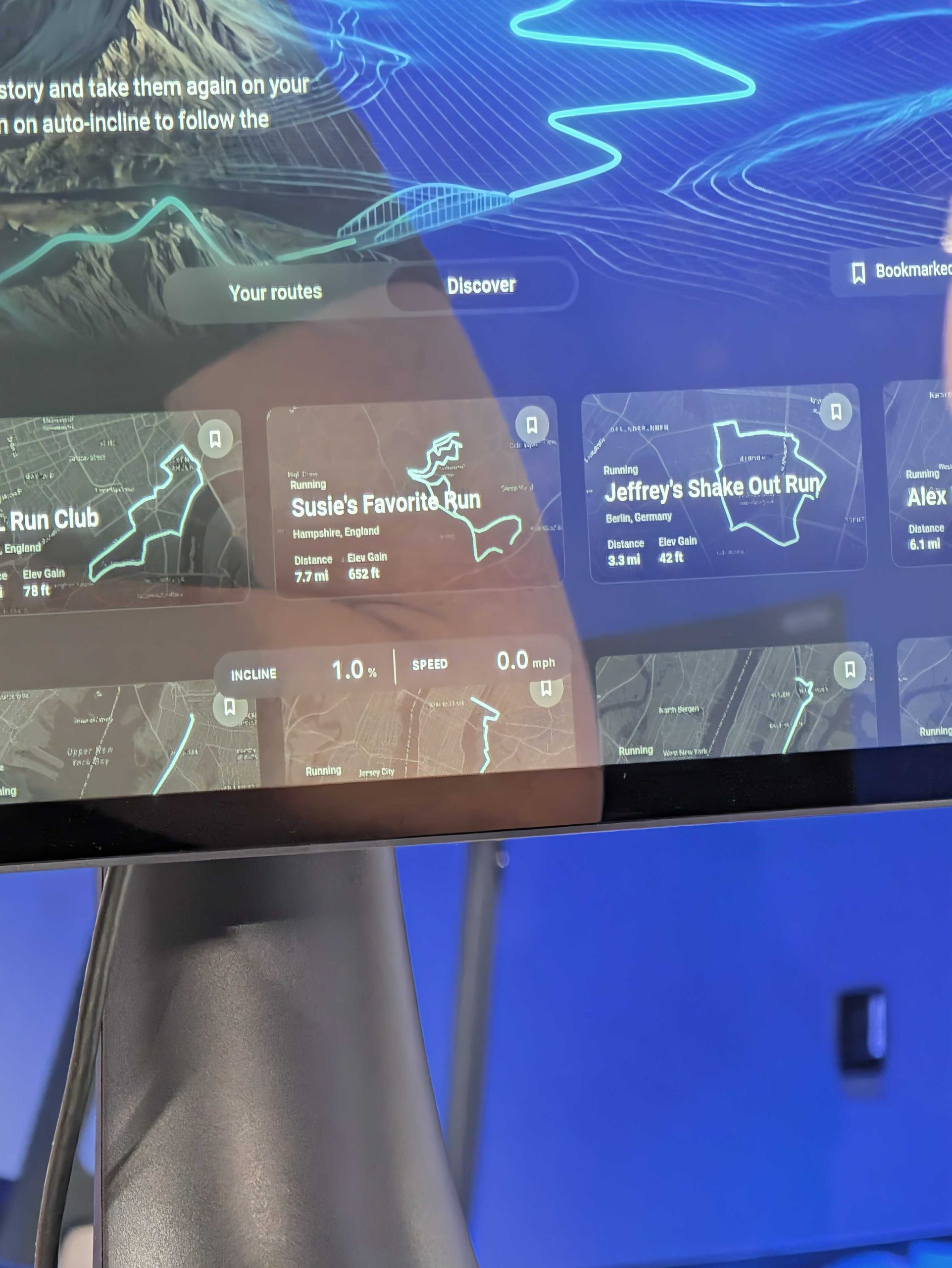image showing new ReRuns feature on the new Peloton Tread Vision. Some of the exciting run routes are shown such as the Run Club routes and Susie's favorite run.