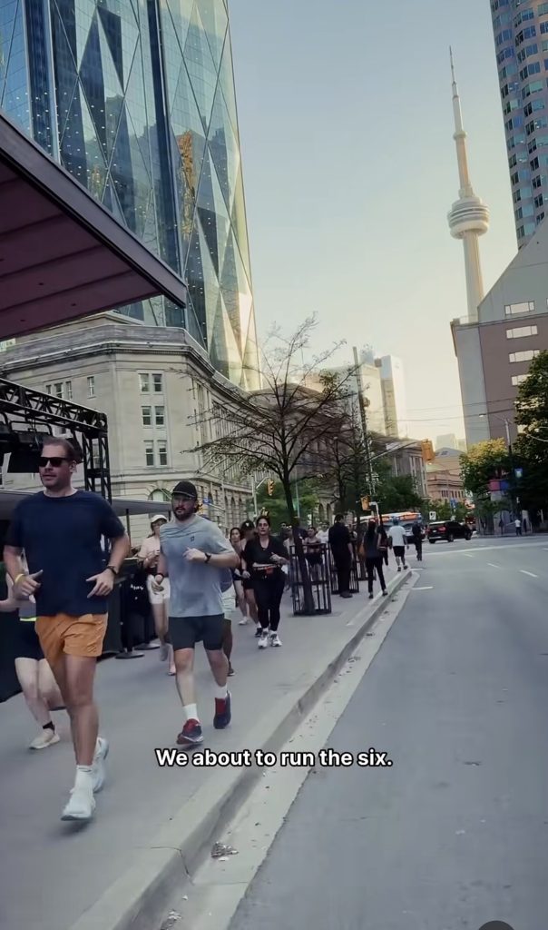 Toronto Waterfront Marathon shakeout run footage with runners and the CN Tower in Toronto
