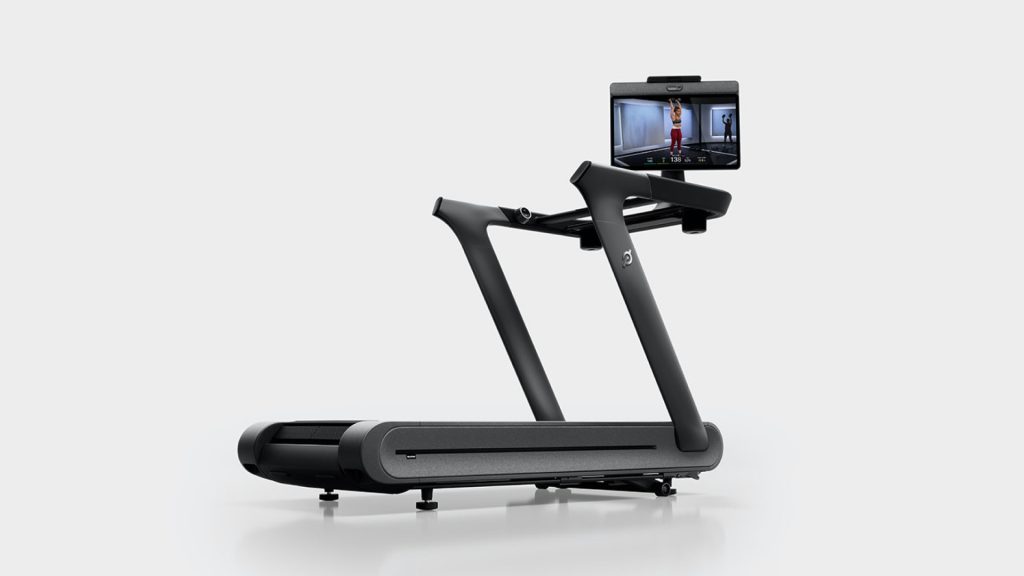 Peloton Tread+ Vision treadmill with touchscreen displaying a strength class