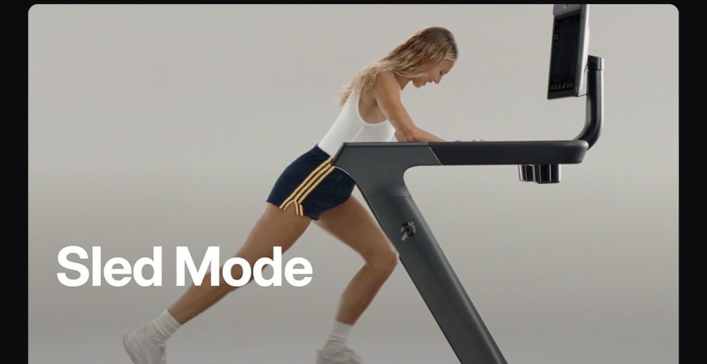 Sled Mode classes hero image showing a member pushing the Peloton Tread+ slat belt in Sled Mode
