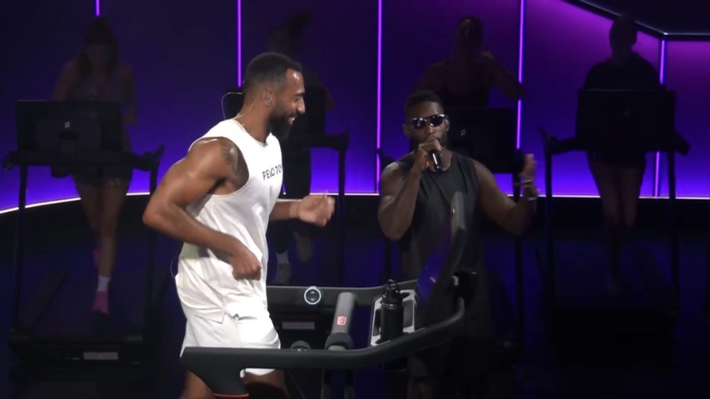 Tinie Tempah Peloton performance with Tinie singing beside Jermaine Johnson’s Tread