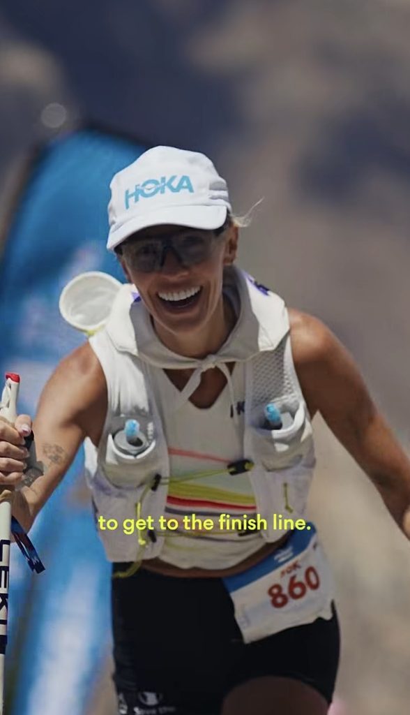 Becs Gentry Hoka trail racing with trekking poles at the Speedgoat 50K